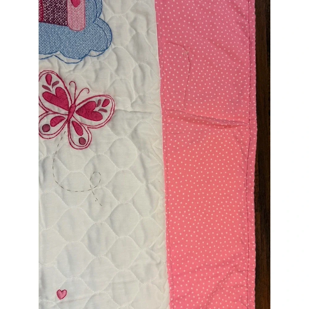 Adorable princess toddler bed quilt. Approx 42X30 in hand made cross-stitched